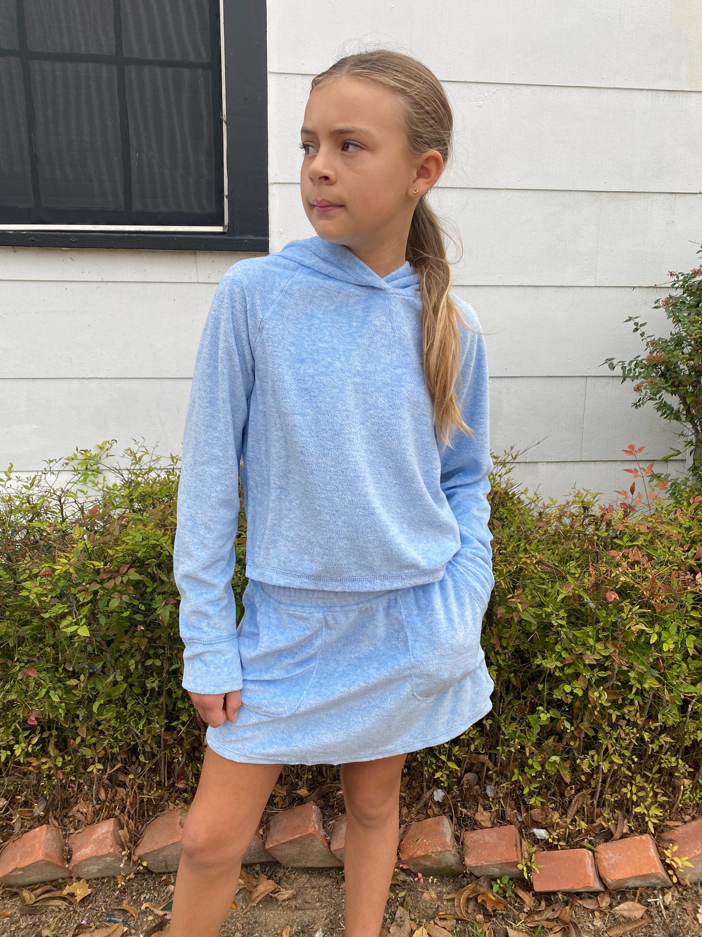 Two Piece Hooded Pullover and Skort Set